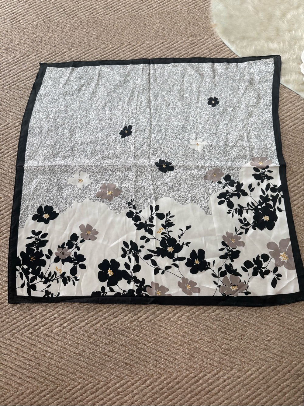 Women’s scarf in luxurious cream, tan and black colors.  Stunning print
